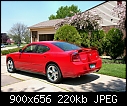 -2007-dodge-charger-hemi-r-t-road-track-performance-group-beside-flowering-crab-trees-torred-rvl